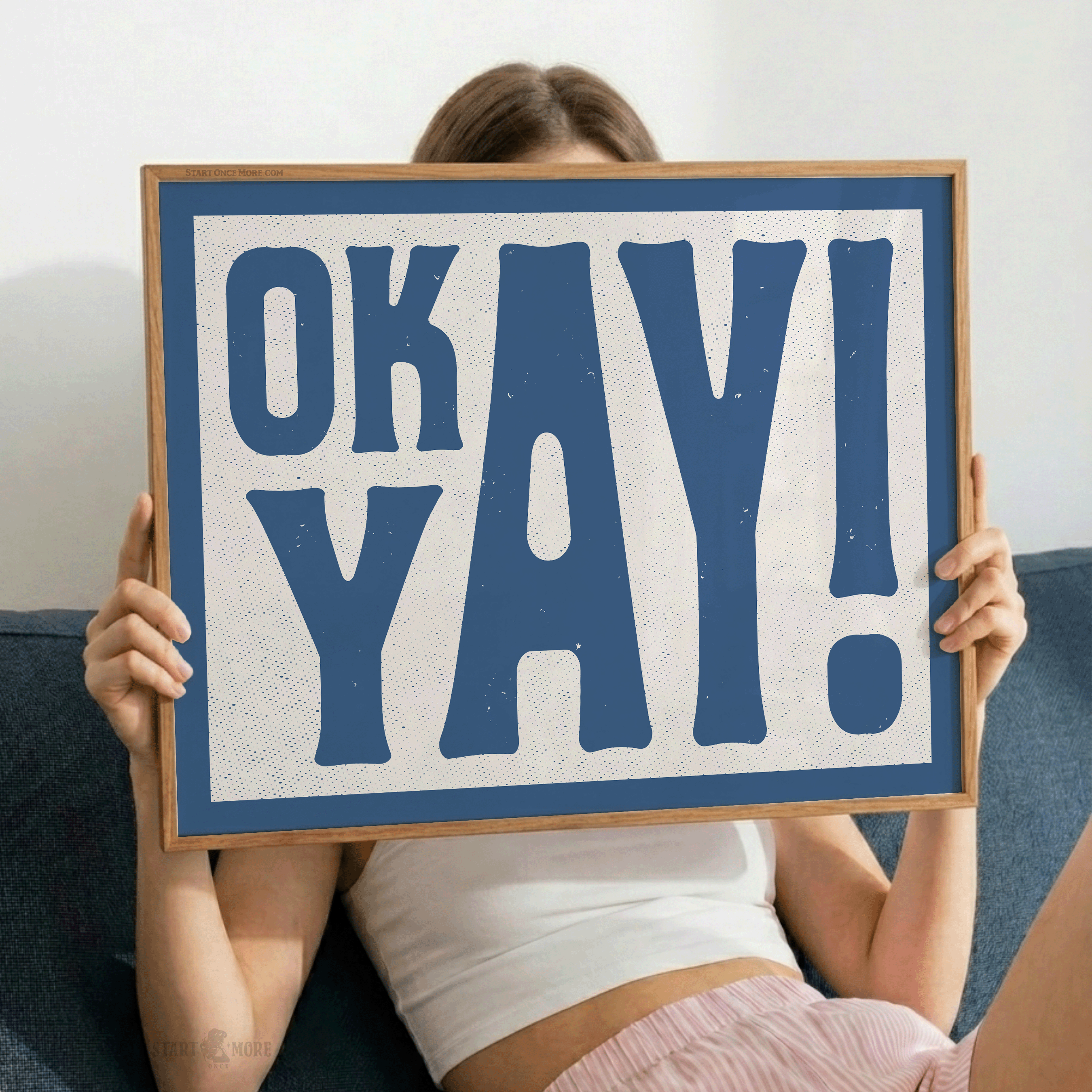 The 'OK YAY!' print being held. A funny birthday gift for a best friend or a 'just because' gift for a girlfriend, emphasizing the relatable, high-energy mood of the typography.