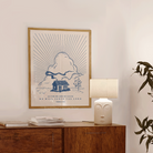 Large Joshua 24:15 scripture print displayed in a western-style entryway with warm wood accents and desert plants